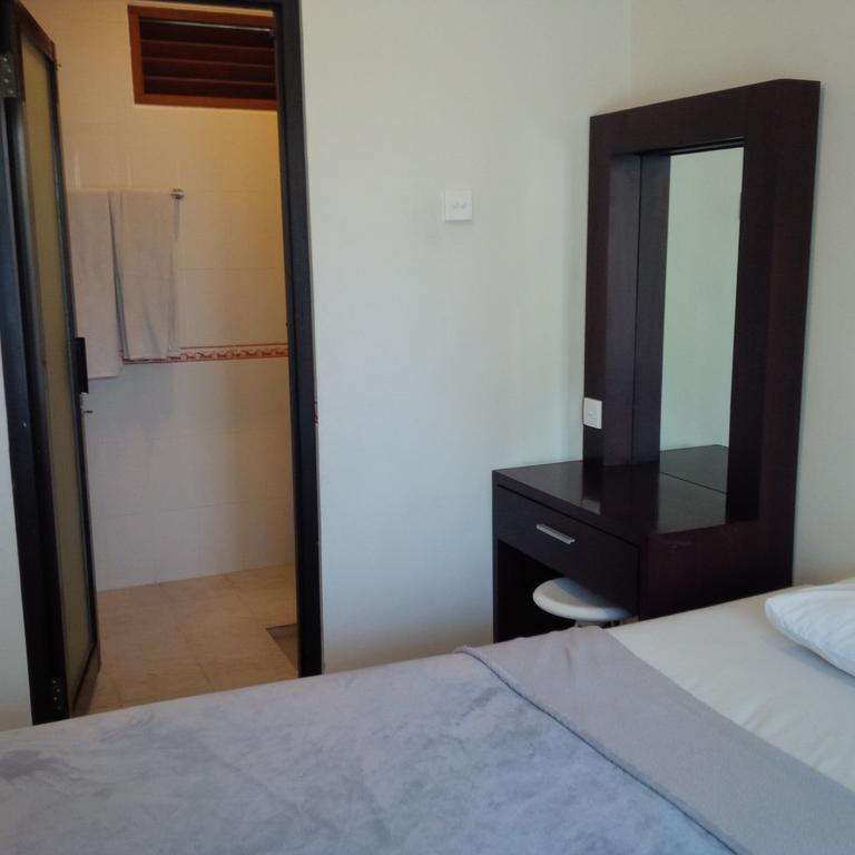 Suji Apartment Bali Værelse billede