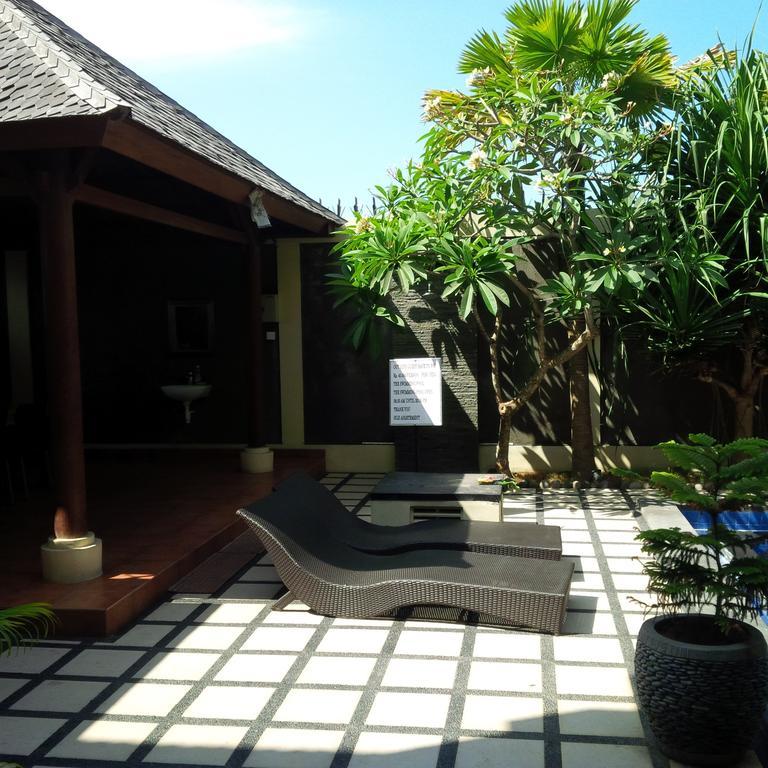 Suji Apartment Bali Værelse billede